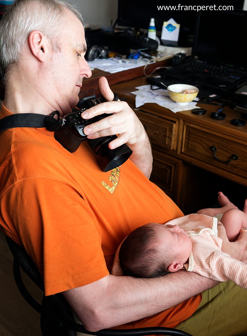 To achieve such a shot  from my point of view (POV), it can become quit acrobatic as soon as my right arm is busy  holding my daughter. Despite the appearance, I am composing the shot precisely, thanks to the swiveling  screen open on the left side of the camera. (Shot by Sarah)