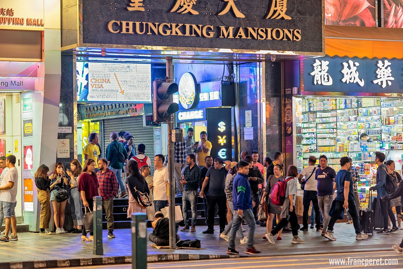 ChungKing Mansions main entrance on Nathan Road, Kowloon, with all the Indian guys trying to sale watches, tailor made suits or promoting rooms or restaurant.