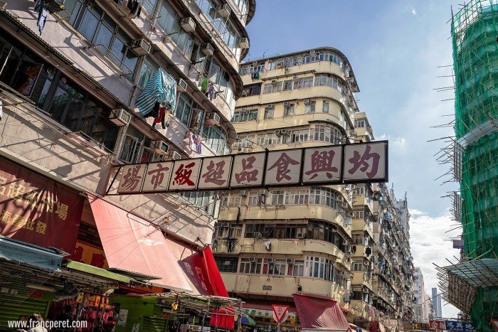 Crowded flats, crowded signs. HKG's Signature